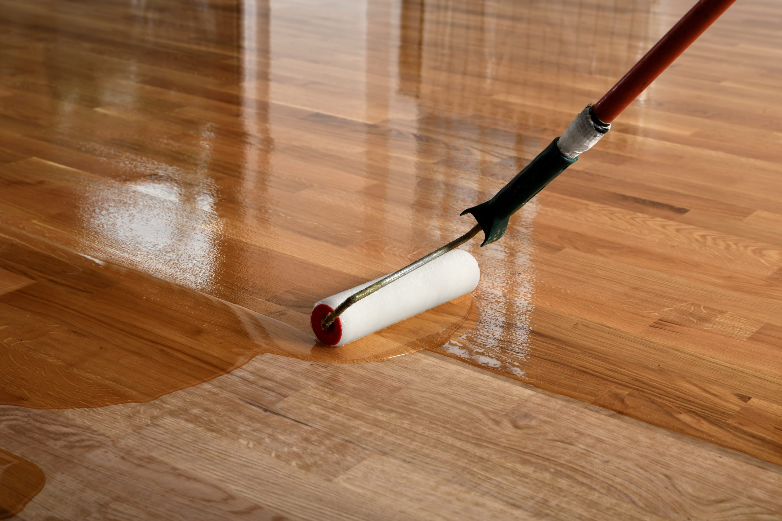 An eco-friendly, natural wood coating is applied to the wooden floor to preserve the beauty, strength, and longevity